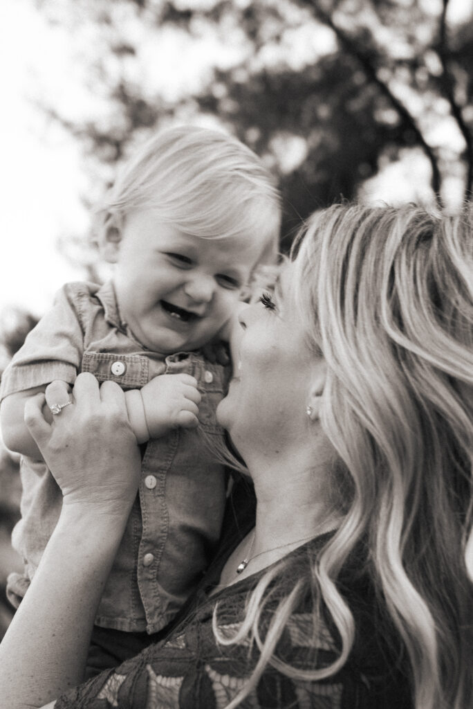 Mom laughing with her toddler son