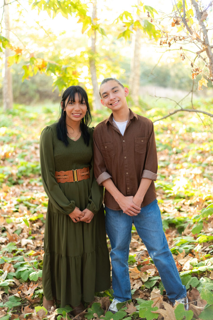 Teenage siblings pose during a family session in Fallbrook, CA