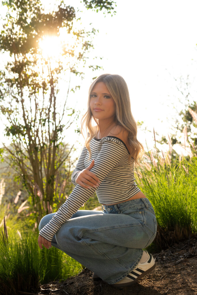 Fallbrook senior photographer photographing a high school senior outdoors